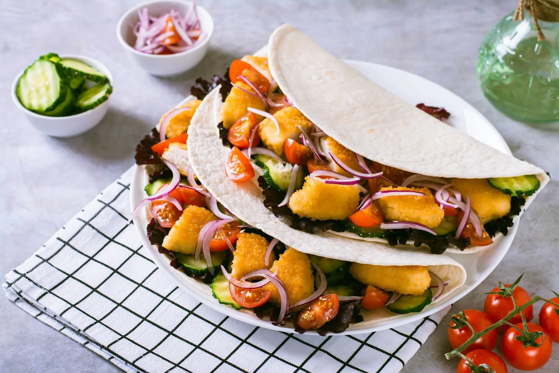 Tacos With Chicken Nuggets Cucumber Tomato Onion A XM3CKSX
