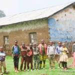 10- Shama Laka students in front of an old classroom block, still in use