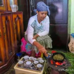 21- a Mom making Ethiopian coffee