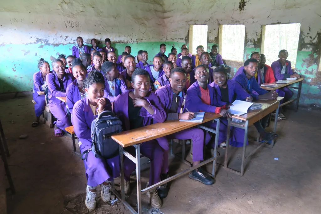 Rapport d’Activités Juillet-Dec 2025 2 students in existing classroom