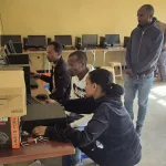 9 computer technician helping shama laka ps teachers