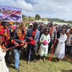 2 cutting the ribbon to open the school block